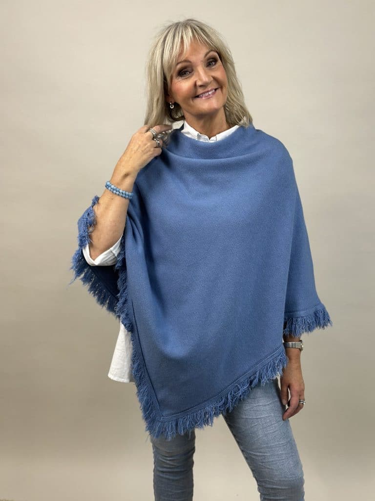 Blå poncho med fransar