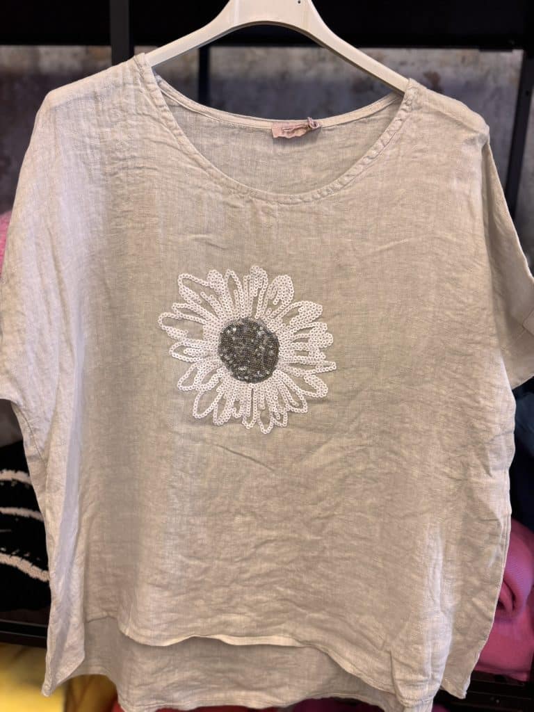 linnetopp med paljettblomma