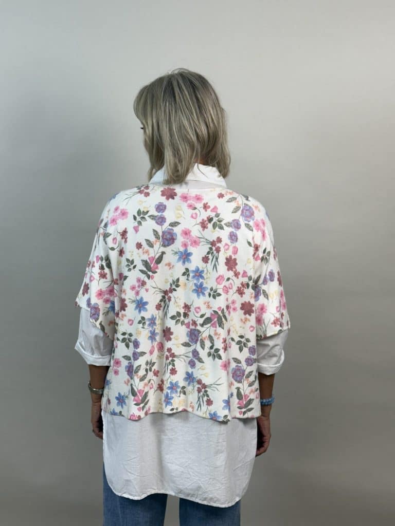 Blommig poncho