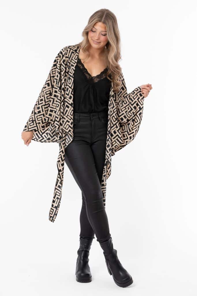 Omlottblus med vida trumpetärmar