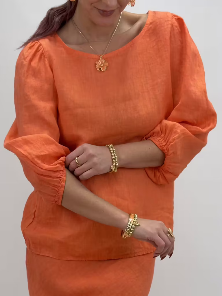 Linnetopp med puffärm i orange