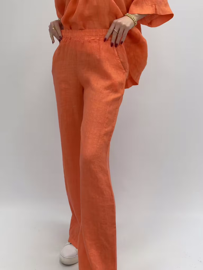 Vida linnebyxor i härlig orangr färg