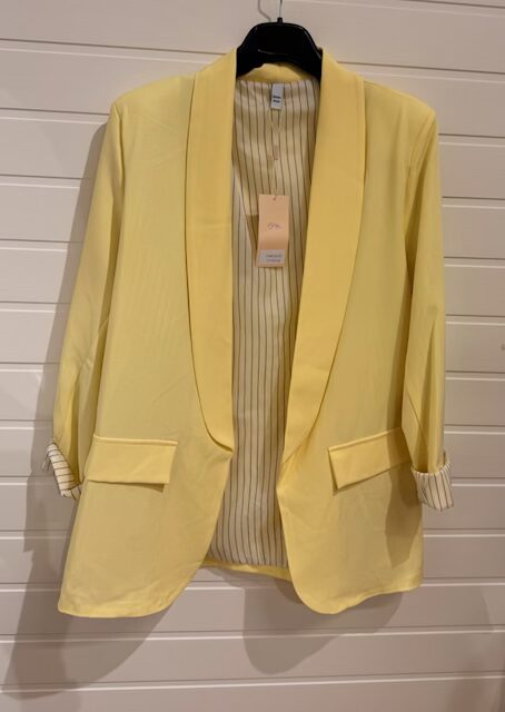 Gul kavaj med randigt foder