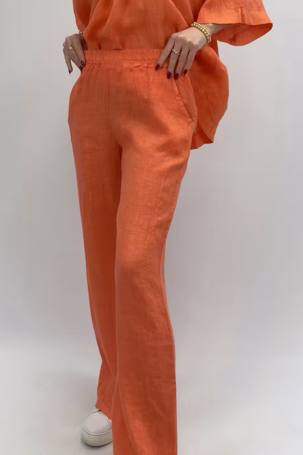 Vida linnebyxor i härlig orangr färg