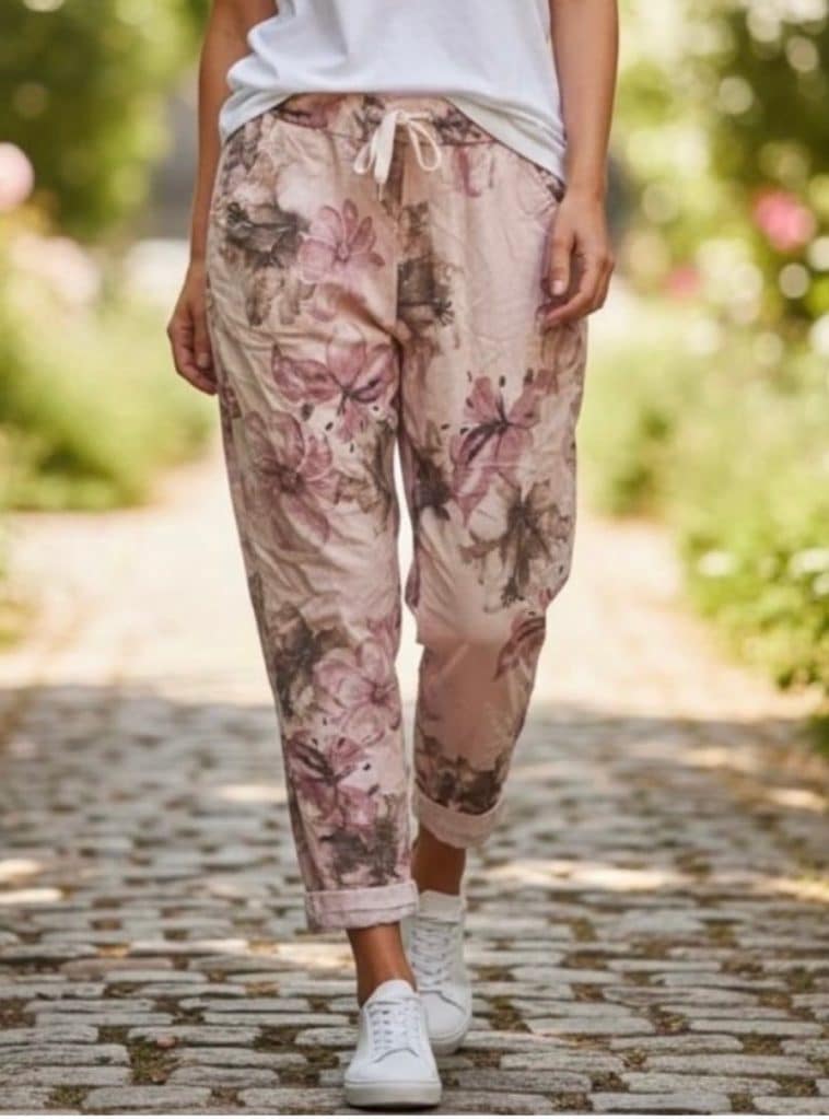 Rosablommiga magiska med rosa botten