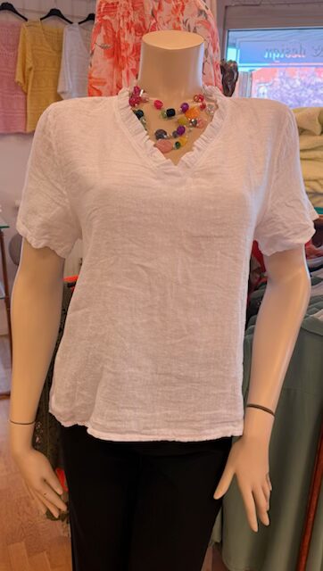 Linnetopp med volangkant i rosa