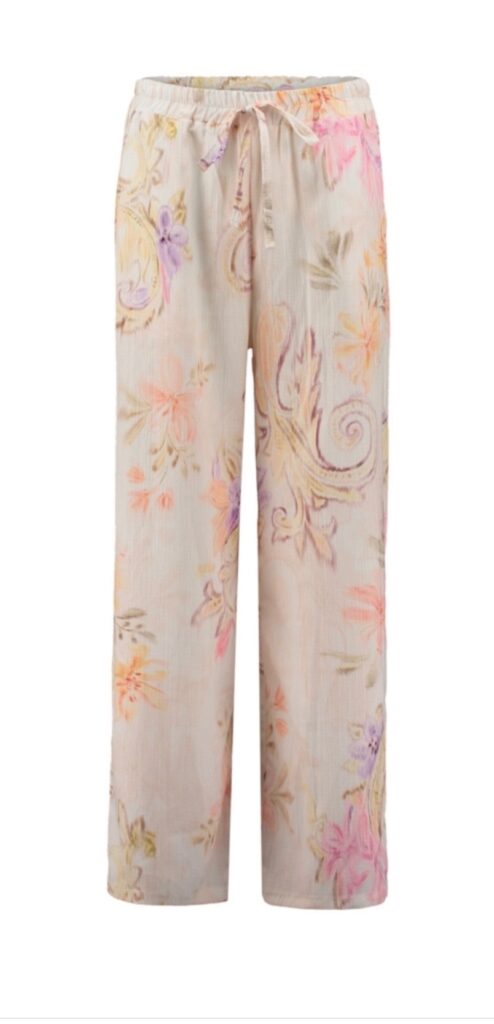 Somriga magiska mönstrade byxor i beige