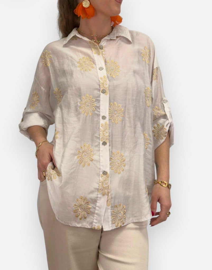 Fantastiskt fin skir blus med gulddetaljer