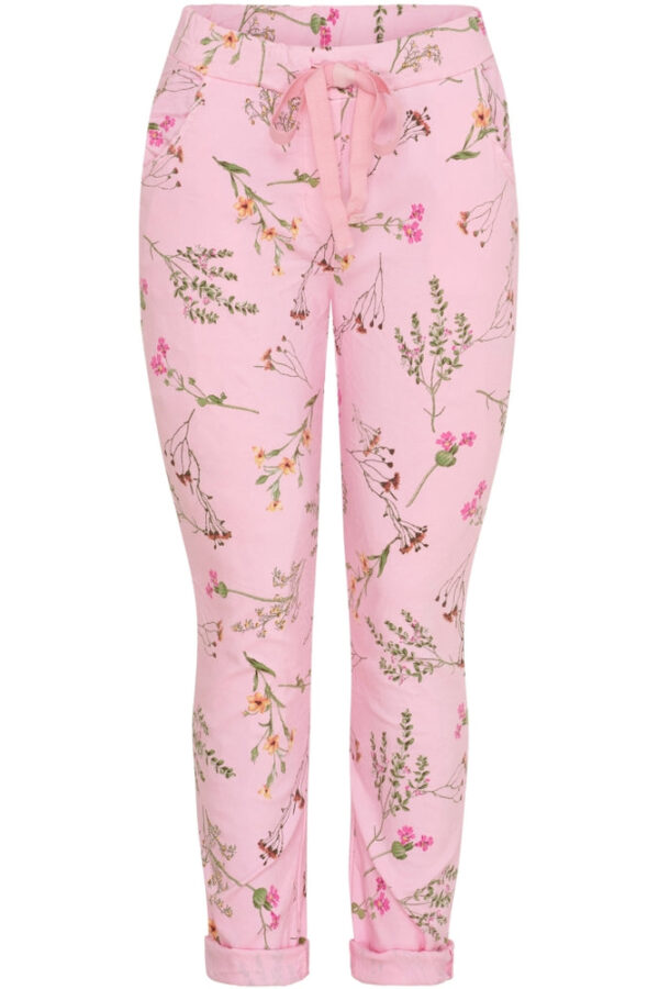 Fräcka magiska byxor i rosa med blommor