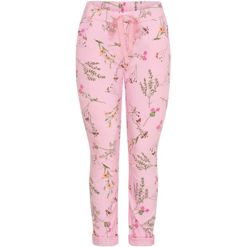 Fräcka magiska byxor i rosa med blommor