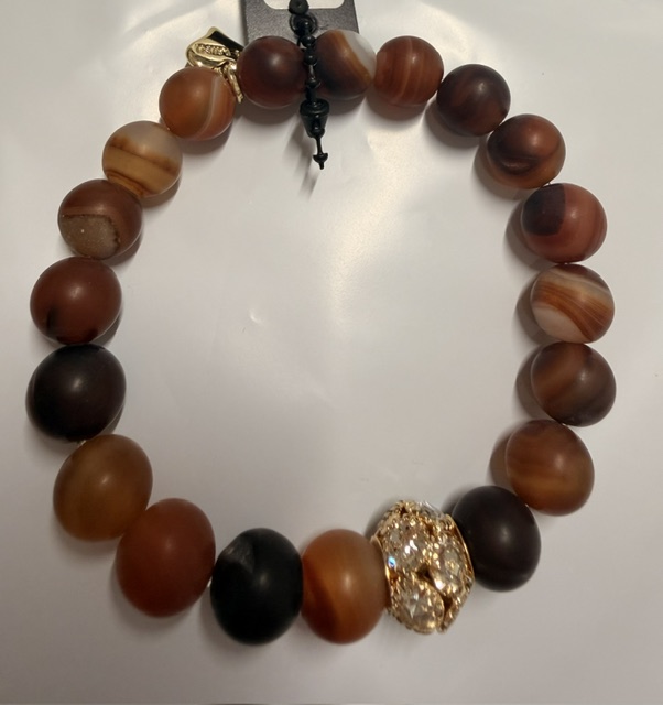 Fint armband i bruna toner