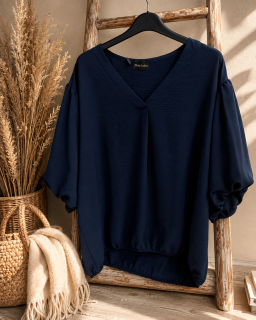 Marinblå blus med puffärm