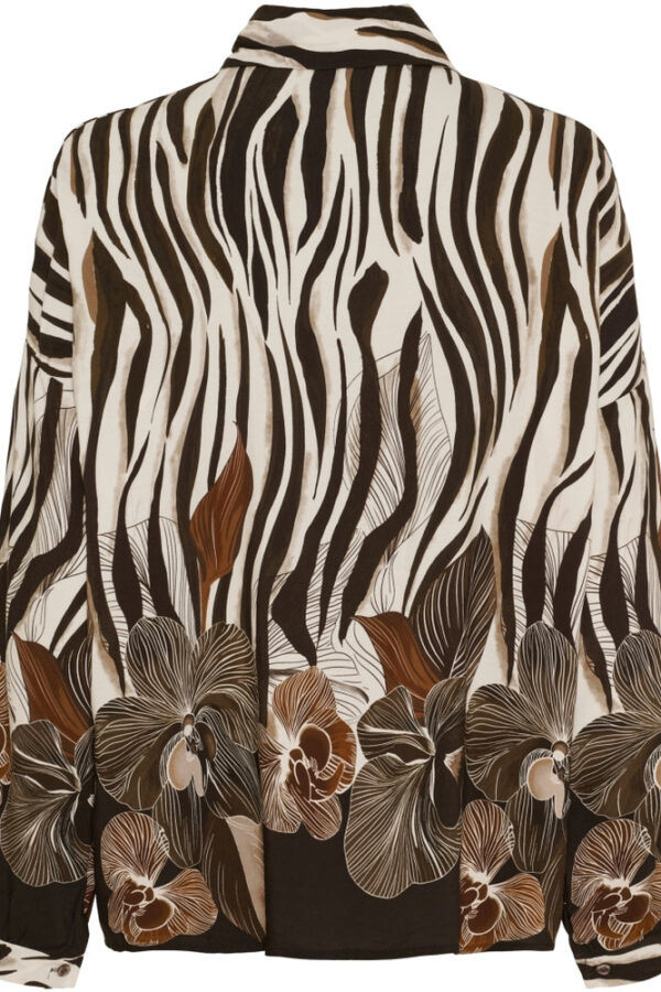 Fin mönstrad blus i zebra och blommönster i chokladbrunt