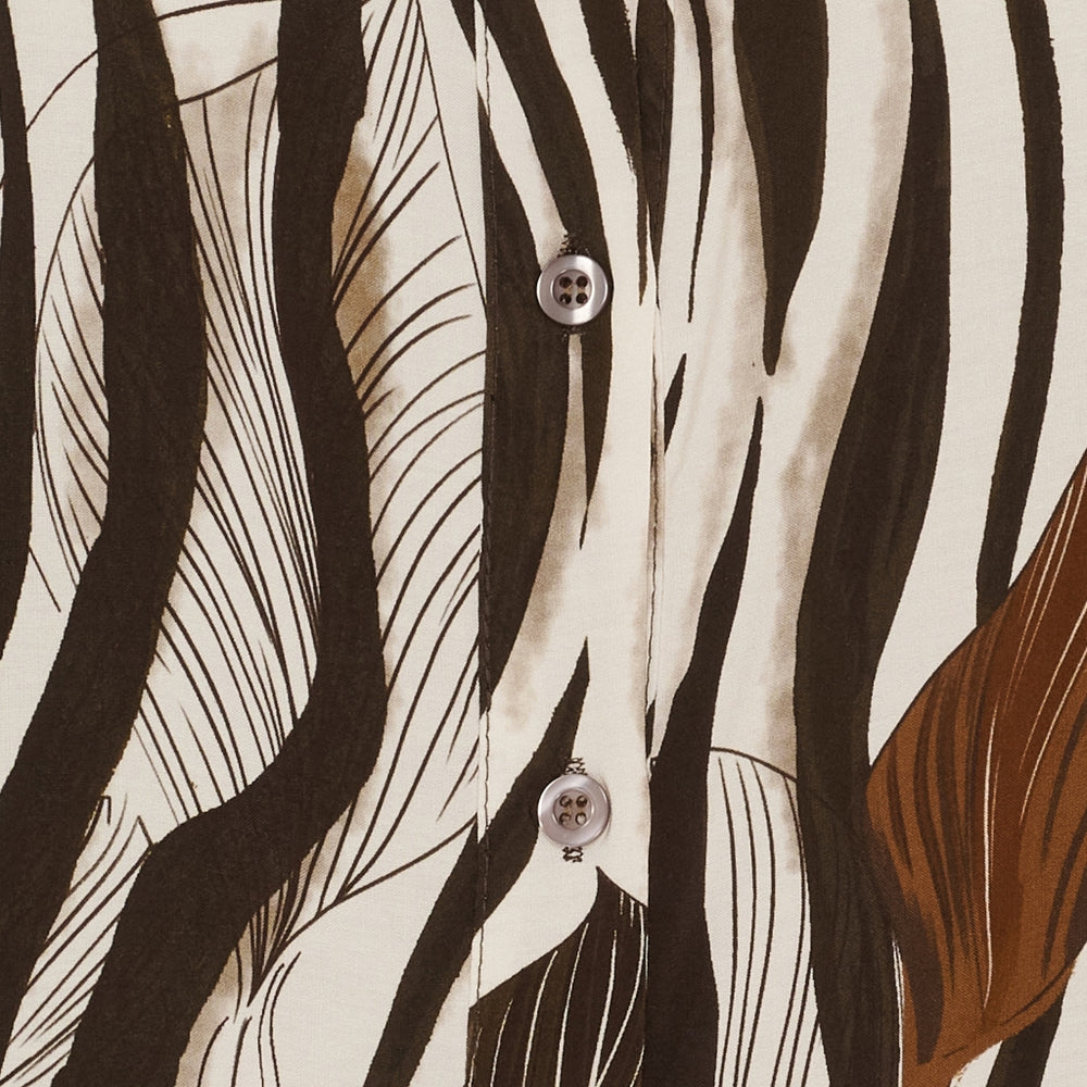 Fin mönstrad blus i zebra och blommönster i chokladbrunt
