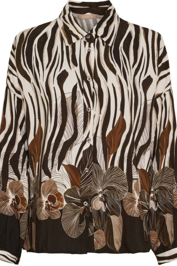 Fin mönstrad blus i zebra och blommönster i chokladbrunt
