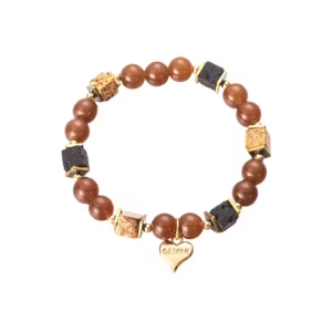 Coolt armband med bruna glasstenar och med inslag av svart och guld