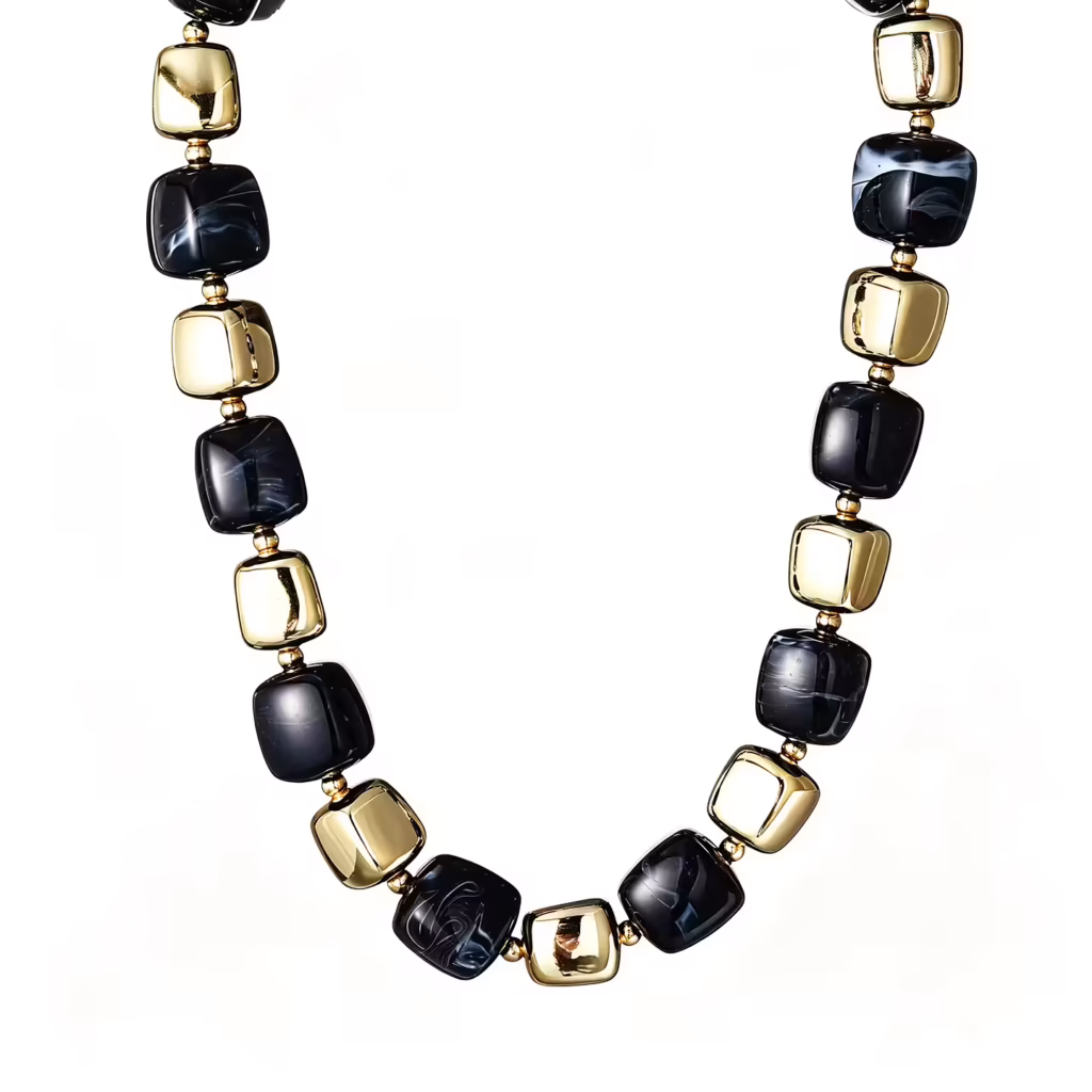 Coolt halsband med fräck design i svart och guld